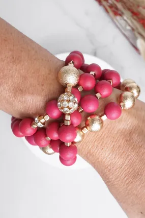 Beaded bracelets set in Red and Gold with clear crystals