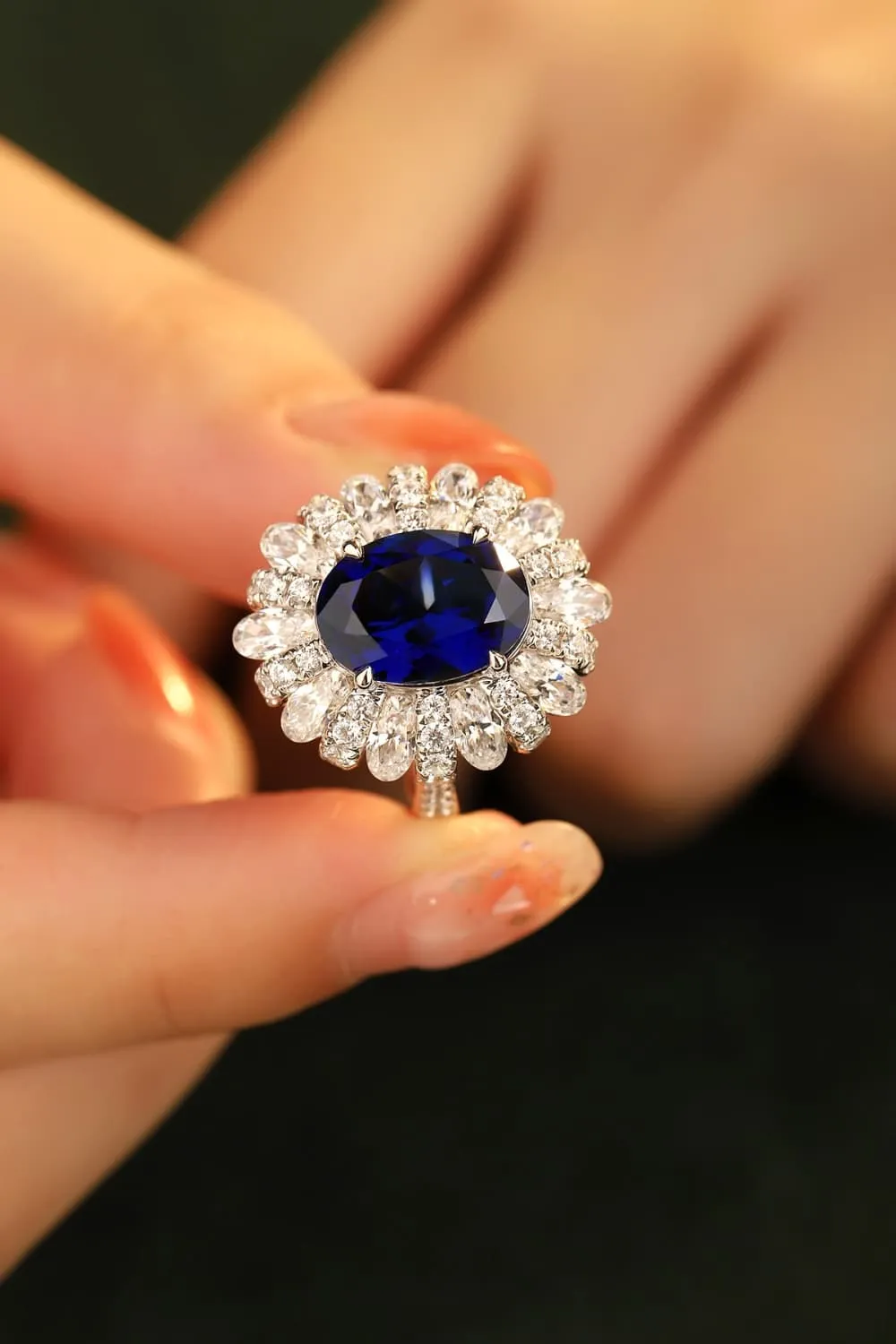 Oval Sapphire in Flower Shape CZ Ring